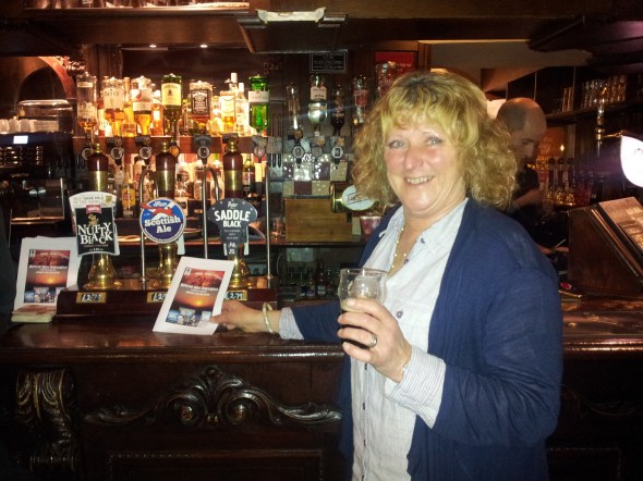 Paula Smart, one of the event organisers, enjoying a glass of Purity Saddleblack at the White Rose.