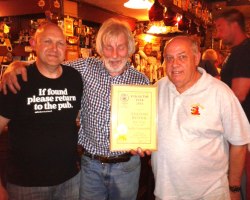 Pictured L-R, Hywel Roberts, Ancient Briton cellar manager, Ancient Briton landlord Gerald James and NPT CAMRA Sub-branch Chairman John Skinner.