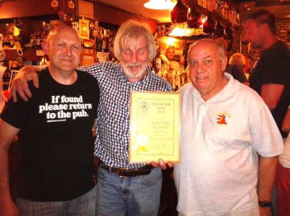 Pictured L-R, Hywel Roberts, Ancient Briton cellar manager, Ancient Briton landlord Gerald James and NPT CAMRA Sub-branch Chairman John Skinner.