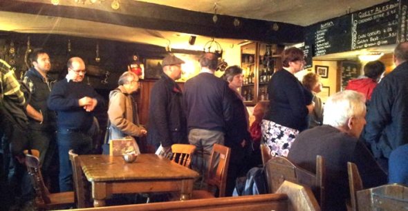 Queuing to be served at the Plough and Harrow in Monknash.