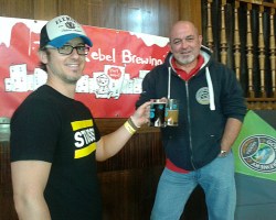 Gareth Williams from Tiny Rebel and Dave Campbell of Gower Brewery accept the award.