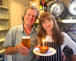 Rof Undy and Karen McGeoch celebrating the first birthday of Mumbles Ale House.