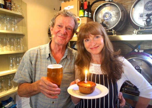 Rod Undy and Karen McGeoch celebrating the first birthday of Mumbles Ale House.