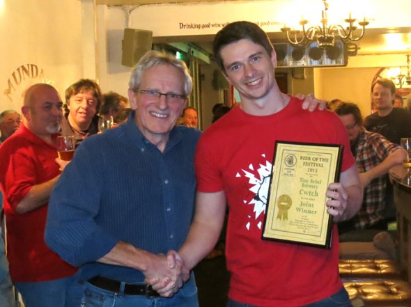 Mike Owen of Tiny Rebel receives the award from festival chairman Chris Radford.