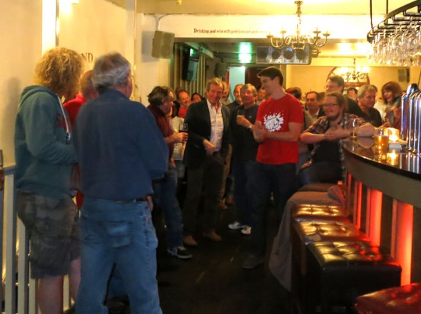 Rod Undy of Mumbles Ale House presents the party with a cask of Oakham Citra.