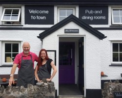 Licensee Paul Crowther with bartender Aprill Richards outside the historic Welcome to Town.