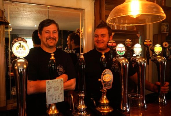 Brewer Gareth Moule, left, with some of Tomos Watkin's cask and keg ales and ciders.