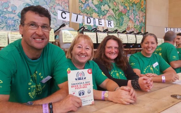 Volunteers serving on the cider stall at last year's beer and cider festival.